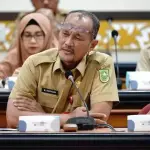 Peningkatan Akses Keuangan di Riau: TPAKD Siapkan Program Inklusi Keuangan untuk 2025